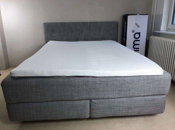 emma mattress topper on bed